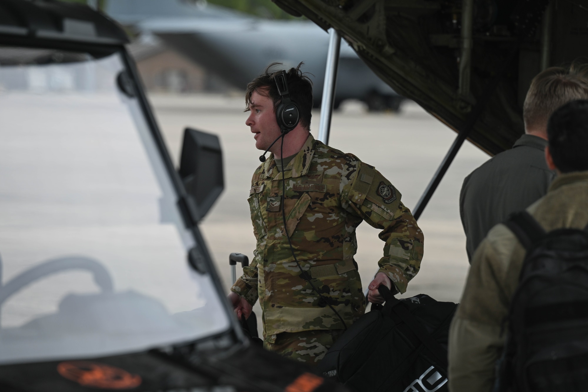 An Airman offloads cargo.
