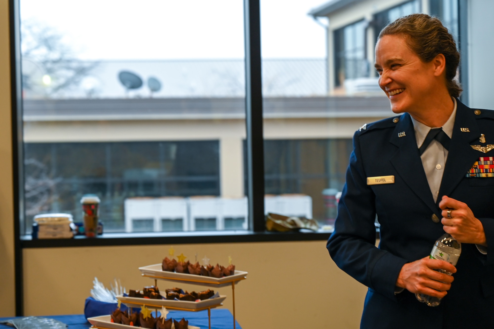 U.S. Air Force Col. Karolyn Teufel, incoming commander, 113th Medical Group, District of Columbia Air National Guard, is congratulated by fellow guardsmen during a change of command ceremony at Joint Base Andrews, Maryland, Jan. 6, 2023.