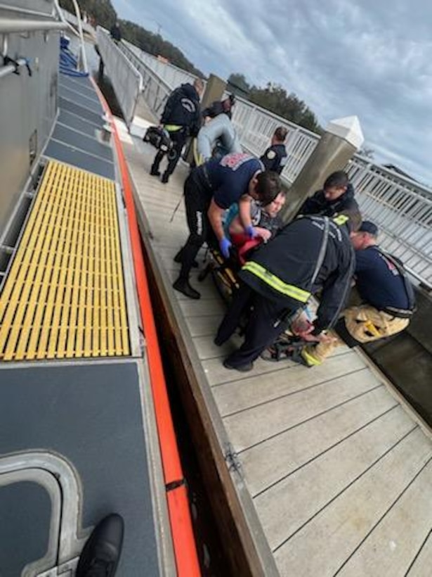 A Coast Guard Station Mayport boat crew rescues three people after their 26-foot sailboat sank near St. Marys Inlet, Georgia, Feb. 4, 2024.