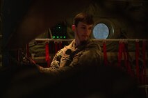 U.S. Air Force Airman 1st Class Jacob LeCates, a loadmaster assigned to the 40th Airlift Squadron, at Dyess Air Force Base, Texas, secures a forklift on a C-130J Super Hercules at Nellis Air Force Base, Nevada, Jan. 25, 2024.