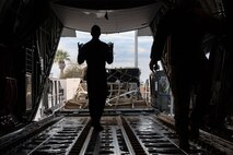 U.S. Air Force Airmen assigned to the 40th Air Lift Squadron and 515th Air Mobility Element (AME) load equipment onto a C-130J Super Hercules in support of Bamboo Eagle 24-1 at Nellis Air Force Base, Nevada, Jan. 25, 2023.