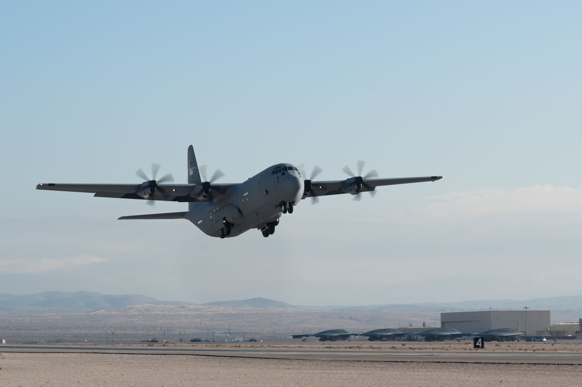 A C-130J Hercules assigned to the 40th Airlift Squadron departs to Naval Auxiliary Landing Field on San Clemente Island in support of bed down operations during Bamboo Eagle 24-1 at Nellis Air Force Base, Nevada, Jan. 25, 2023.