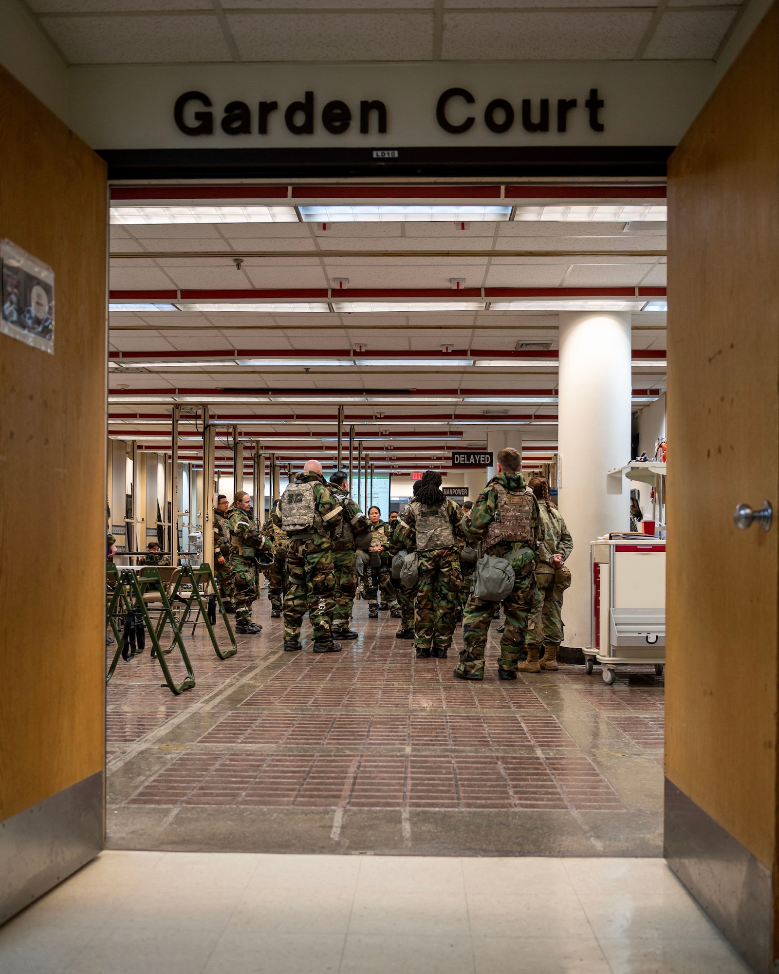 U.S. Air Force Airmen assigned to the 51st Medical Group prepare for simulated patients to arrive in a mass casualty training event during Beverly Midnight 24-1 at Osan Air Base, Republic of Korea, Feb. 1, 2024. The mission of the 51st MDG is to maintain and ensure medical readiness for contingencies by providing high-quality, trusted care for approximately 8,000 enrollees and 20,000 beneficiaries. BM24-1 is a routine training event that tests the military capabilities across the peninsula, allowing combined and joint training at both the operational and tactical levels. (U.S. Air Force photo by Staff Sgt. Aubree Owens)