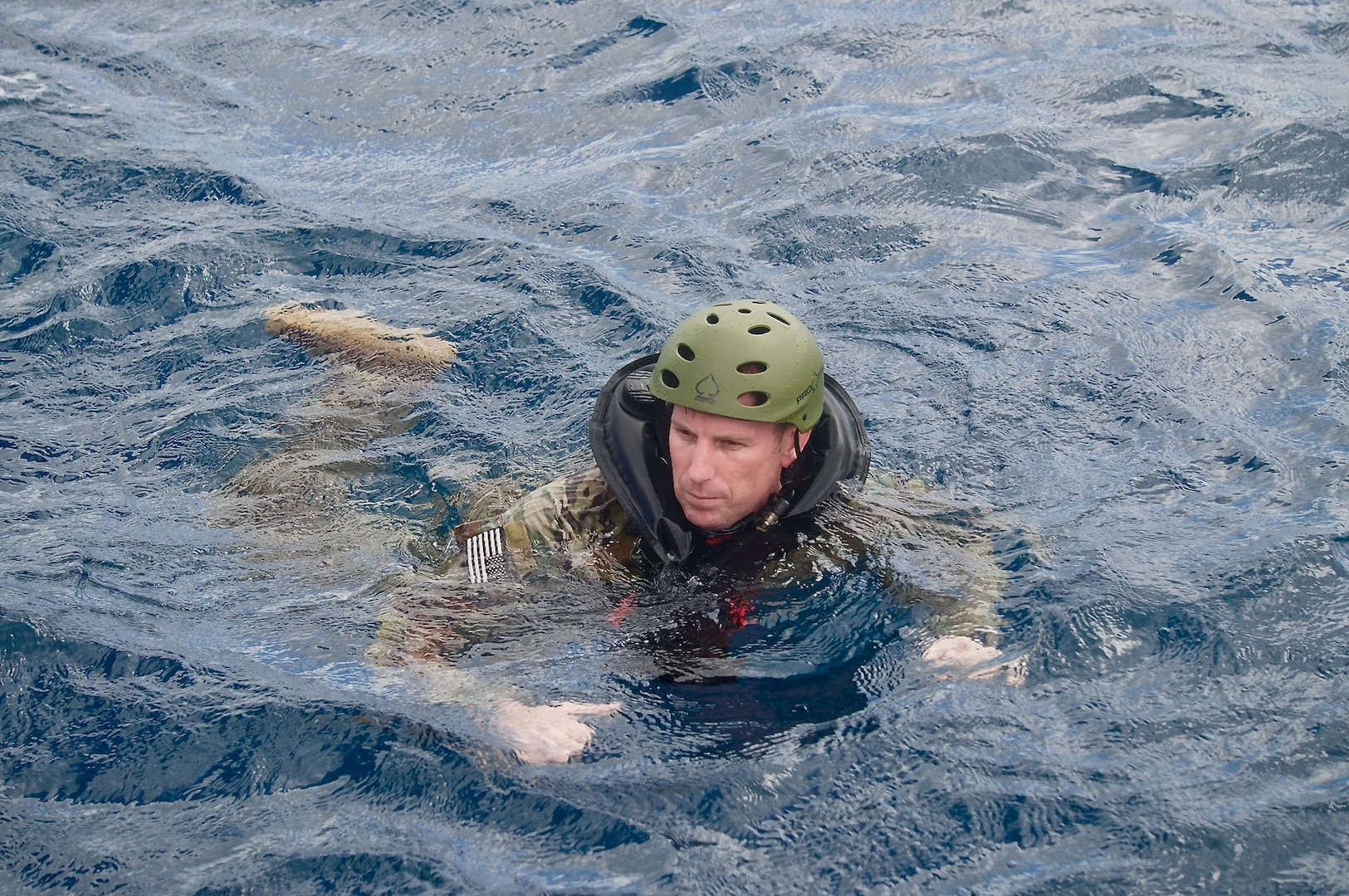 In a demonstration of inter-service cooperation and expertise, the crew of the U.S. Coast Guard Station Apra Harbor's 45-foot Response Boat-Medium supported an intricate cast and recovery training exercise in Apra Harbor on Feb. 1, 2024. This vital training involved collaboration with the U.S. Army Scouts from the 3rd Squadron, 4th U.S. Cavalry Raiders of the 3rd Infantry Brigade Combat Team (IBCT), 25th Infantry Division, and the U.S. Navy Helicopter Sea Combat Squadron 25 - the "Island Knights," based at Andersen Air Force Base.