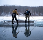 LITTLE FALLS, Minn. (Jan. 25, 2024) – U.S. Navy Divers assigned to Mobile Diving and Salvage Unit (MDSU) 2 prepare to dive in simulated Arctic waters during Snow Crab Exercise 24-1. SNOWCRABEX is an annual exercise designed to test and evaluate U.S. Navy EOD and Navy Diver’s capabilities and equipment in a simulated arctic environment and improve combat effectiveness. Navy EOD and Navy Divers are part of the Navy Expeditionary Combat Force (NECF), enabling the U.S. Navy Fleet by clearing and protecting the battlespace. (U.S. Navy Photo by Mass Communication Specialist 1st Class Jacob D. Bergh/Released)