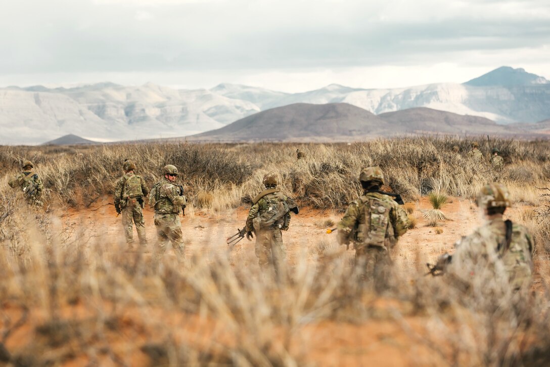 U.S. Soldiers with Bravo Company, 1st Battalion, 112th Infantry Regiment, 56th Stryker Brigade Combat Team prepare for combat in a situational training exercise at Camp McGregor, New Mexico, Jan. 24, 2024. They are training at Camp McGregor as they prepare for a deployment to the Horn of Africa. (U.S. Army photo by Staff Sgt. Jonathan Campbell)