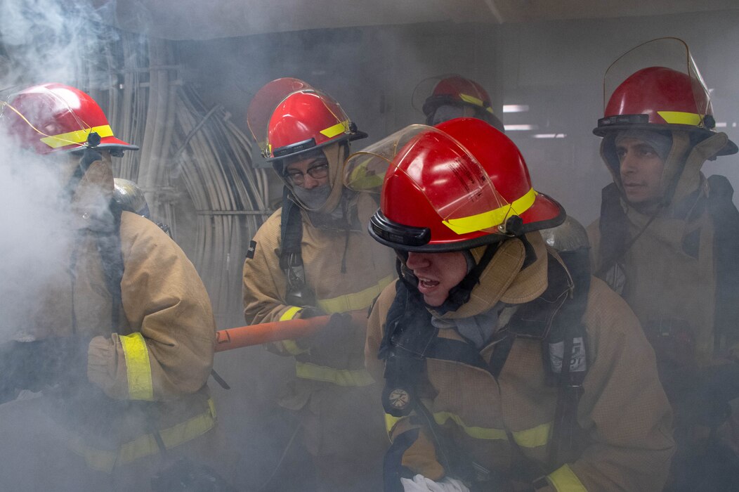 USS America (LHA 6) damage control drill in the Philippine Sea.
