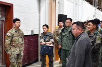 A Korean Soldier, serving under the Korean Augmentation to the United States Army, or KATUSA, program, briefs senior leaders on his work in the temperature-sensitive medical product section during a visit to the U.S. Army Medical Materiel Center-Korea. USAMMC-K is one of numerous locations around the peninsula where KATUSA Soldiers serve alongside their U.S. counterparts, training and serving as a reminder of the alliance and partnership between the two nations.