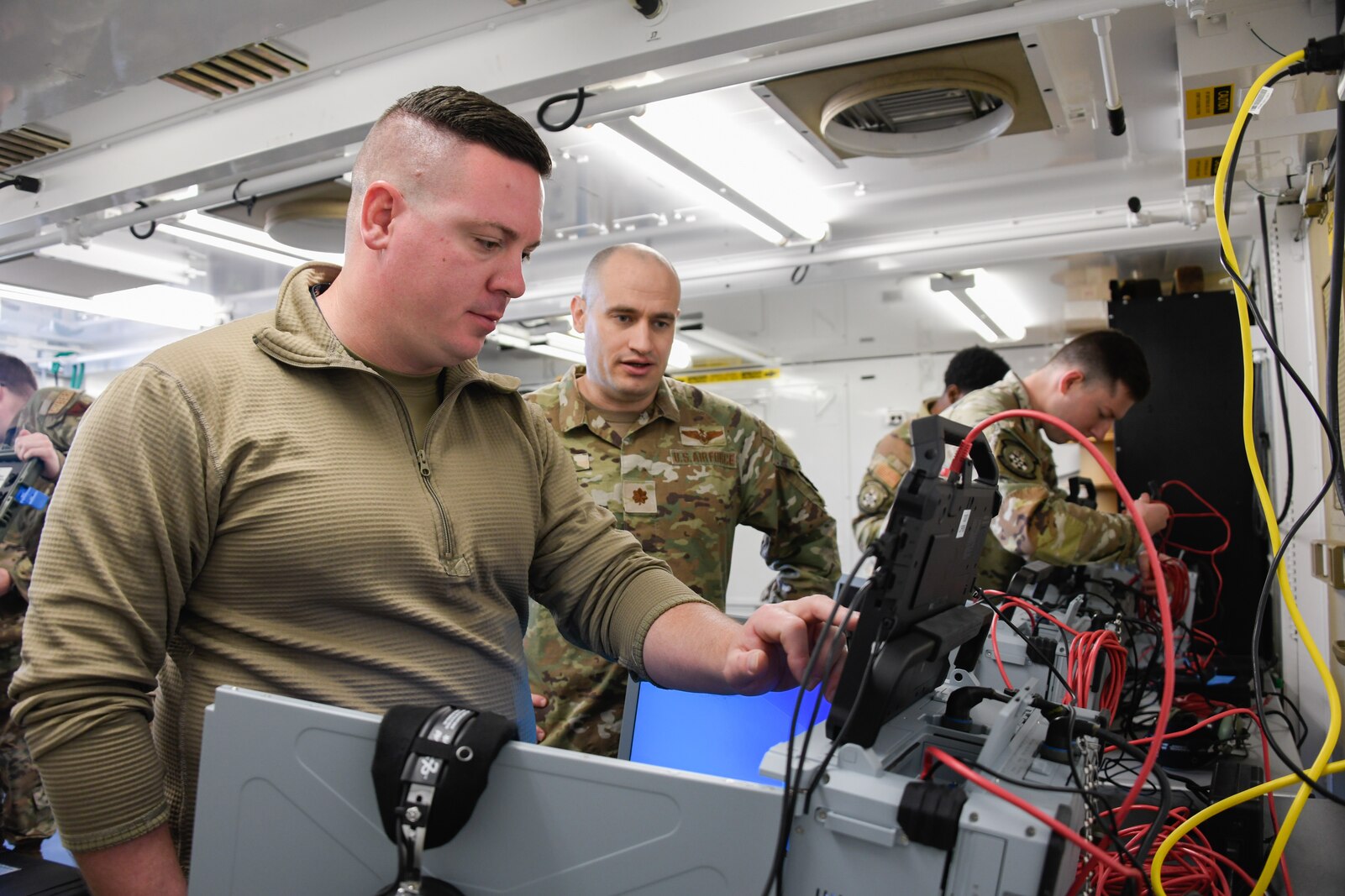 U.S. Air Force Senior Airman Carmen Mitchum, 752nd Operations Support Squadron, installs hardware for the Tactical Operations Center – Light during a training collaboration with the 134th Air Control Squadron at McConnell Air Force Base, Kansas, Jan. 29, 2024. The TOC-L system is a mobile tactical-edge battle management system designed to operate across all domains from anywhere on the battlefield.
(U.S. Air National Guard photo by Master Sgt. Matt McCoy)