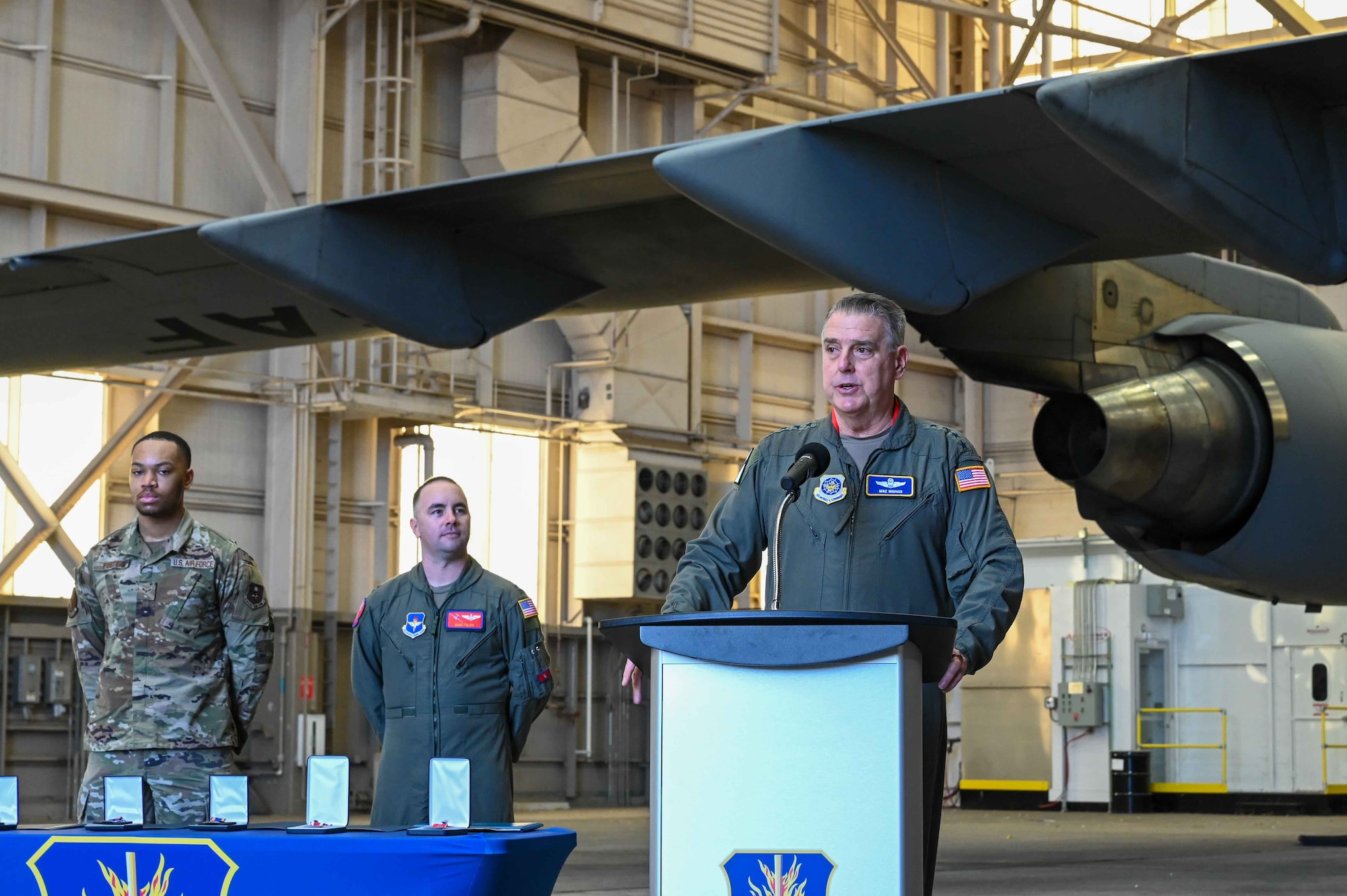 U.S. Air Force Gen. Mike Minihan, Air Mobility Command commander, addresses Airmen from the 97th Air Mobility Wing at Altus Air Force Base, Oklahoma, Feb. 2, 2024. Minihan awarded one Airman the Bronze Star Medal with Valor, one Airman the Meritorious Service Medal, and three Airmen the Air Medal for Combat. (U.S. Air Force photo by Airman 1st Class Kari Degraffenreed)