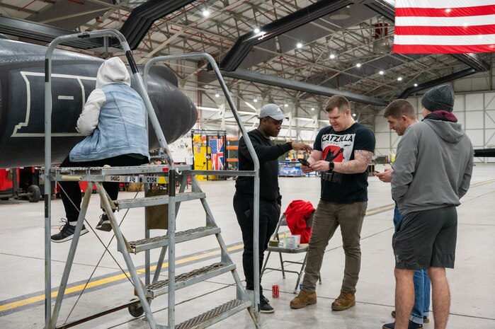 Members of the 99th Expeditionary Reconnaissance Squadron prepare to draw on a U-2 Dragon Lady.