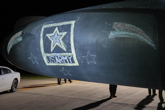 A completed mural in remembrance of U.S. Army Staff Sgt. William Rivers, Sgt. Kennedy Sanders and Sgt. Breonna Moffett is displayed on a U-2 Dragon Lady.