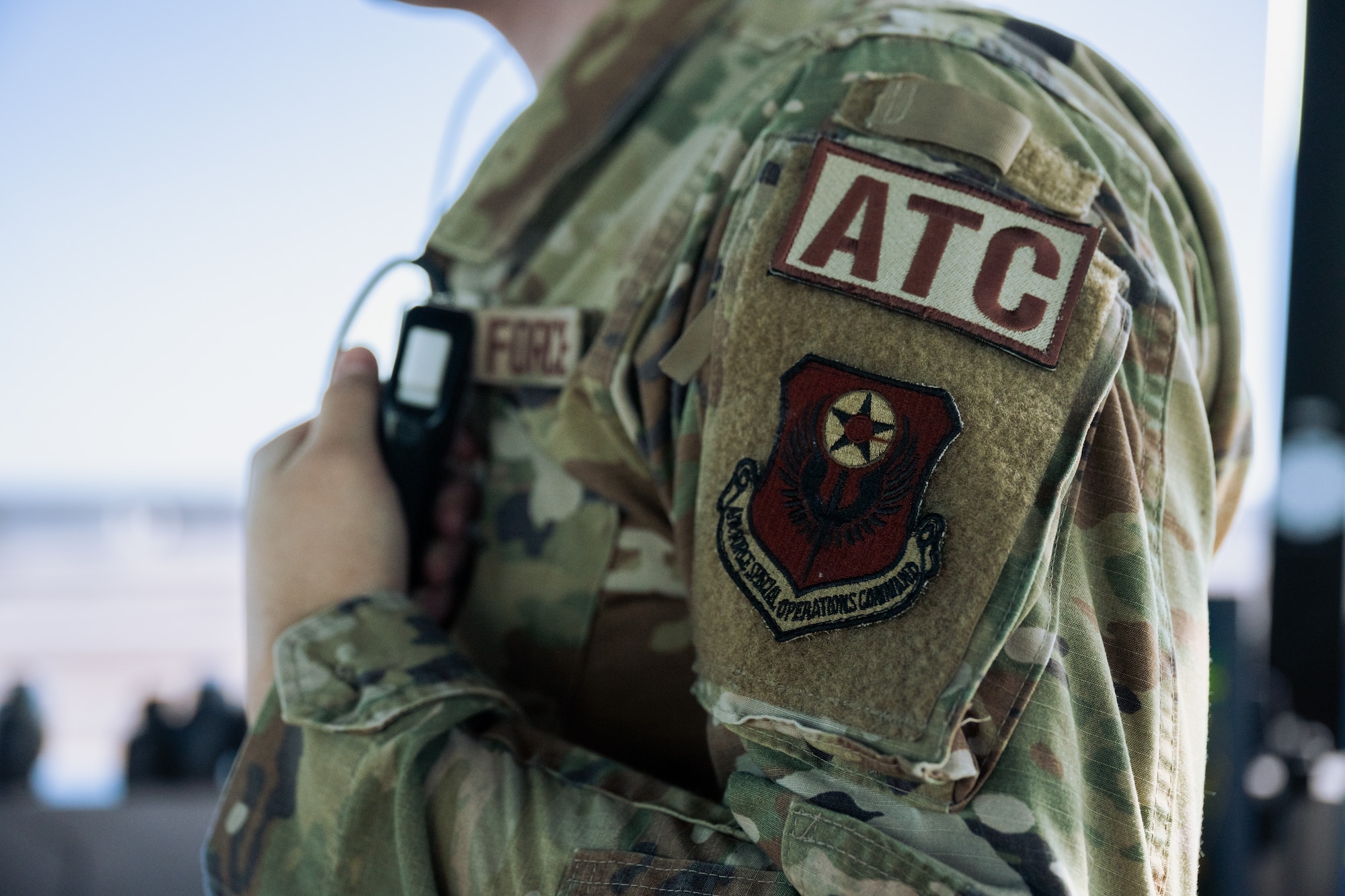 U.S. Air Force Airman 1st Class Samuel Lazano, a 1st Special Operations Support Squadron air traffic control journeyman, talks on a radio in the air traffic control tower at Hurlburt Field, Florida, Jan. 30, 2024.
