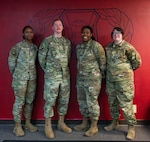 Members of the 91st Operations Support Squadron pose for a group photo at Minot Air Force Base, North Dakota, Feb. 01, 2024. This is the third consecutive year the 91st Missile Support Operations Squadron has secured the Sergeant Dee Campbell Outstanding Large Unit of the Year award, which encompasses the entire aviation resource management career field.