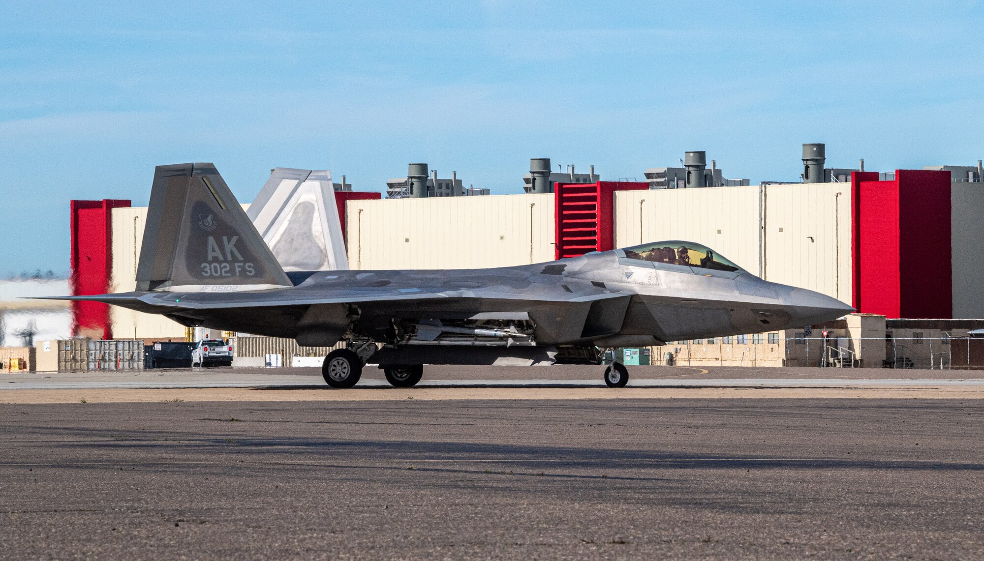 An F-22 Raptor deployed under the 525th Expeditionary Fighter Squadron, 3rd Air Expeditionary Wing, Joint Base Elmendorf-Richardson, Alaska, taxis on the airfield during Exercise Bamboo Eagle 24-1 at Naval Air Station North Island, California, Jan. 28, 2024
