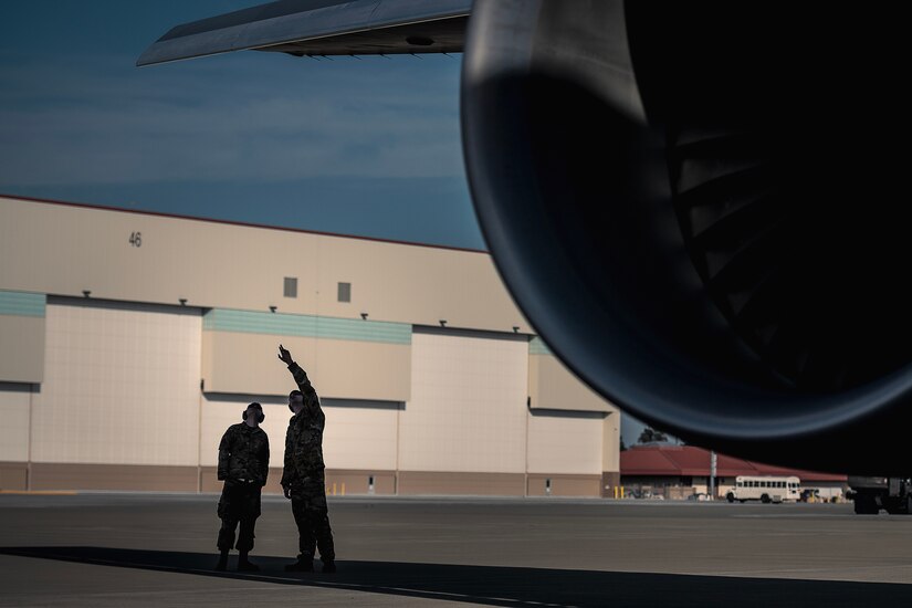 U.S. Air Force maintainers assigned to the 22nd Aircraft Maintenance Squadron, McConnell Air Force Base, Kan., inspect a 2nd Air Refueling Squadron KC-46A Pegasus at Travis AFB, Calif., during Exercise Bamboo Eagle 24-1, Jan. 29, 2024. Bamboo Eagle 24-1 is an operational implementation of multi-domain combat readiness training. (U.S. Air Force photo by Staff Sgt. Austin Knox)