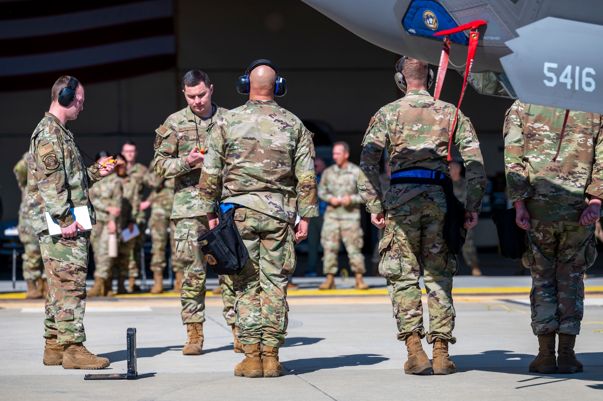 Airmen stand at attention