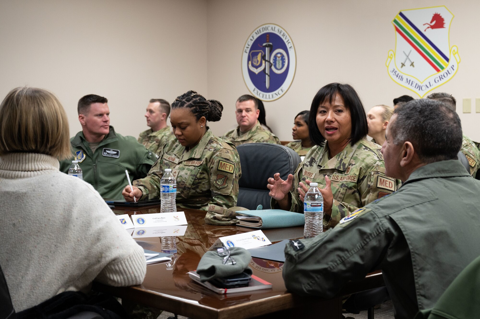 U.S. Air Force Lt. Gen. David Nahom, right, commander, Alaskan NORAD Region, Alaskan Command and Eleventh Air Force, receives a briefing from Col. Fara Buss, 354th Medical Group commander, during a base visit at Eielson Air Force Base, Alaska, Feb. 1, 2024.