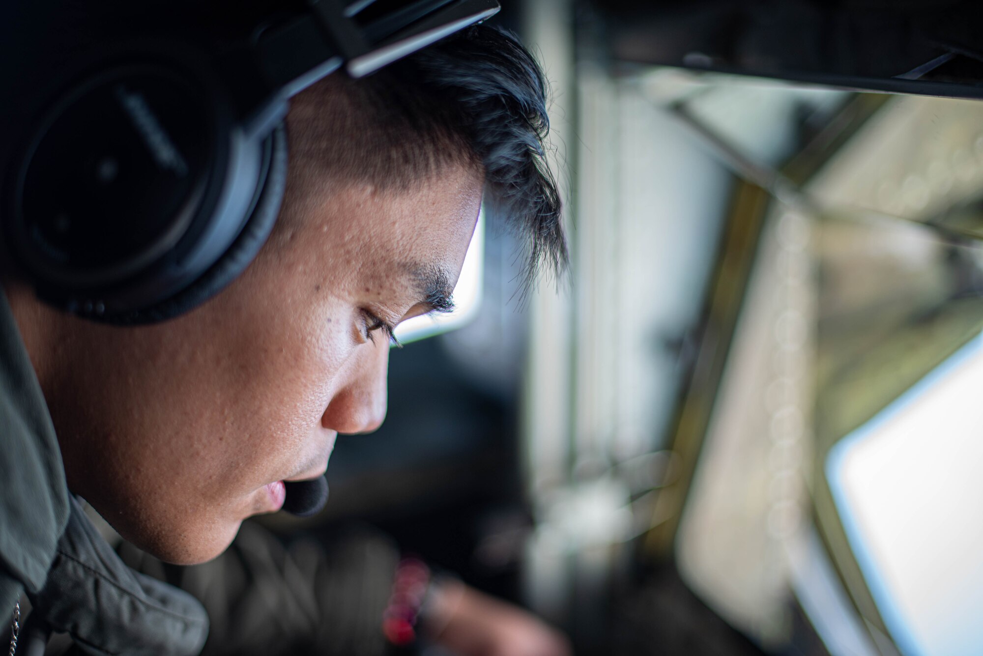 Boom operator looks out of window