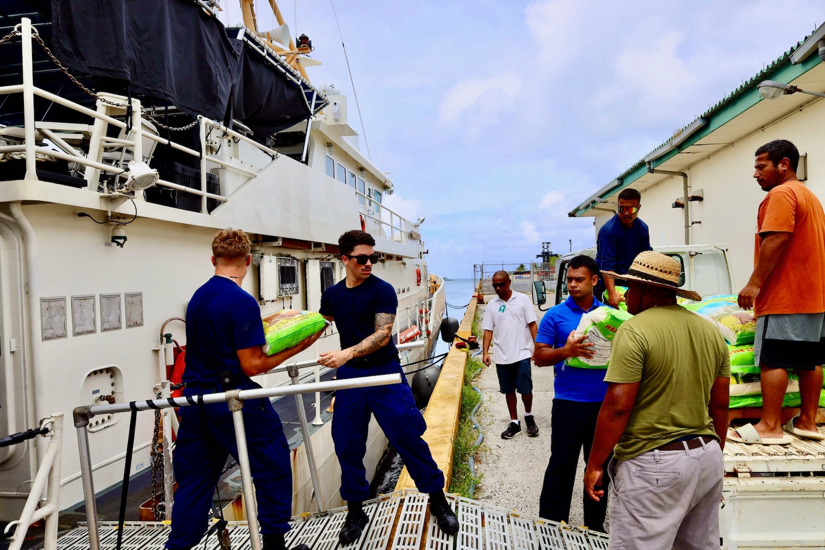 POHNPEI, Federated States of Micronesia — The USCGC Oliver Henry (WPC 1140) crew arrived at Dekhitik Harbor in Pohnpei on Feb. 1 as part of an international effort to deliver essential supplies and equipment to the drought-affected outer islands of Nukuoro and Kapingamarangi Atolls. Due to the El Niño weather phenomenon, these remote communities required immediate assistance, including water purification solutions, to combat the scarcity of potable water.