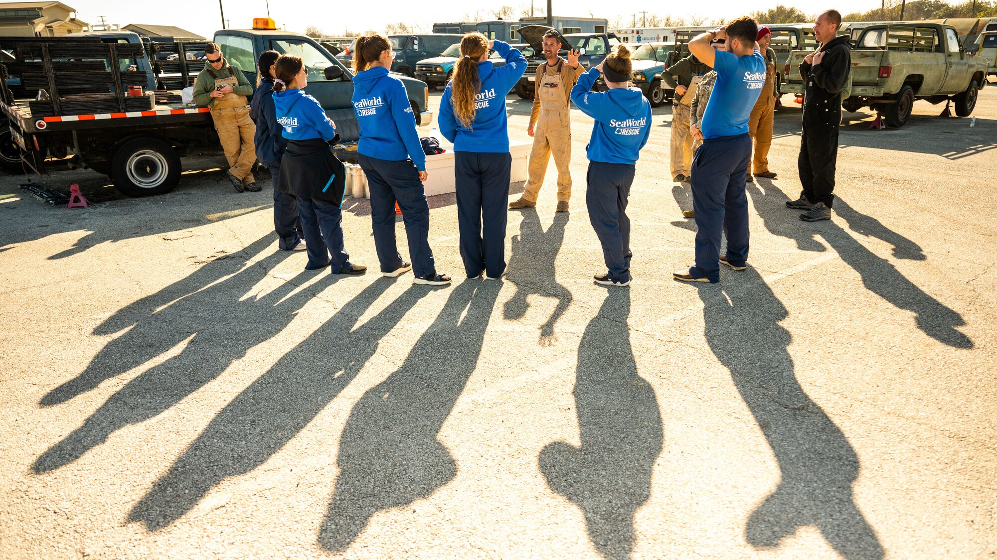 A 341st Training Squadron Dog Handler demonstrates training techniques to SeaWorld trainers who participated in a cross-training collaboration on Jan. 11 and Jan. 19, 2024.