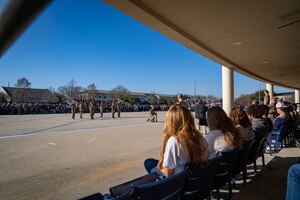 Bay High School Junior ROTC cadets watch 81st Training Group students perform freestyle drill movements at Keesler Air Force Base, Mississippi, Feb. 2, 2024.