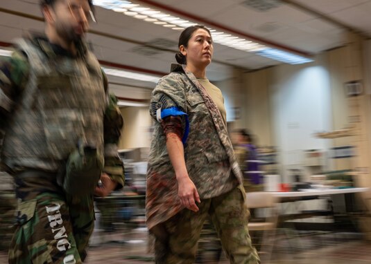 A U.S. Air Force Airman simulates as a triage patient in a mass casualty training event during Beverly Midnight 24-1 at Osan Air Base, Republic of Korea, Feb. 1, 2024. The 51st Medical Group received 80 simulated patients during the training event that had a range of injuries including ​​lacerations, severe burns, hearing loss and altered mental states. BM24-1 is a routine training event that tests the military capabilities across the peninsula, allowing combined and joint training at both the operational and tactical levels. (U.S. Air Force photo by Staff Sgt. Aubree Owens)