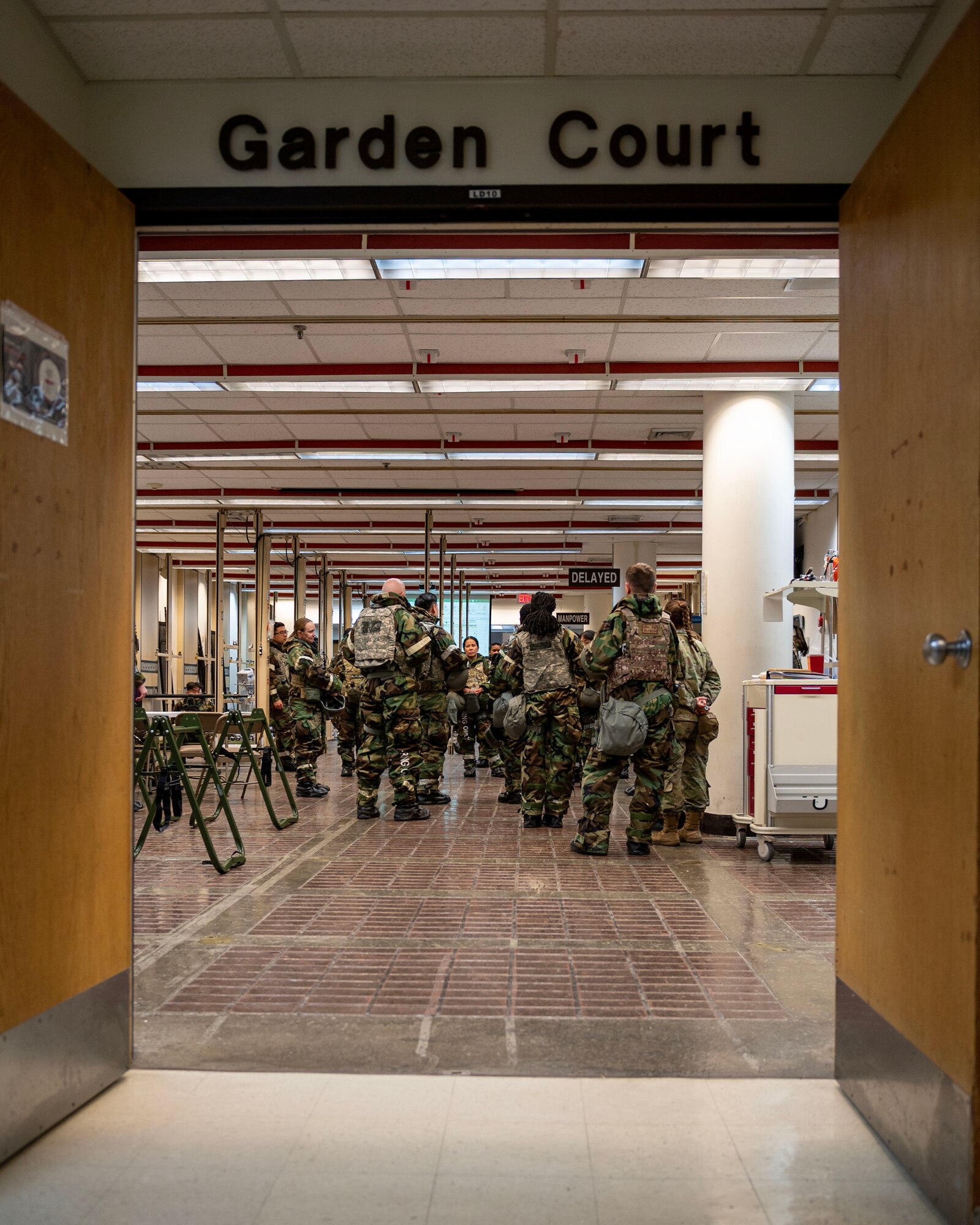U.S. Air Force Airmen assigned to the 51st Medical Group prepare for simulated patients to arrive in a mass casualty training event during Beverly Midnight 24-1 at Osan Air Base, Republic of Korea, Feb. 1, 2024. The mission of the 51st MDG is to maintain and ensure medical readiness for contingencies by providing high-quality, trusted care for approximately 8,000 enrollees and 20,000 beneficiaries. BM24-1 is a routine training event that tests the military capabilities across the peninsula, allowing combined and joint training at both the operational and tactical levels. (U.S. Air Force photo by Staff Sgt. Aubree Owens)