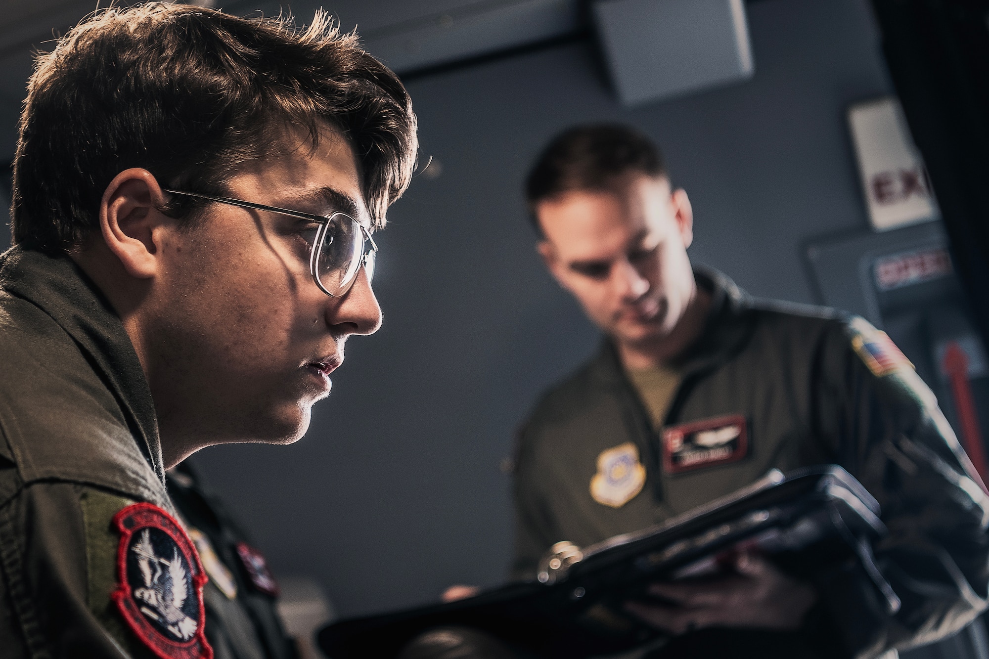 U.S. Air Force Airman 1st Class Ryan Kinkead, 2nd Air Refueling Squadron boom operator, conducts a preflight checklist aboard a KC-46A Pegasus during Bamboo Eagle 24-1 at Travis Air Force Base, Calif., Jan. 29, 2024. Bamboo Eagle 24-1 is an operational implementation of multi-domain combat readiness training. (U.S. Air Force photo by Staff Sgt. Austin Knox)