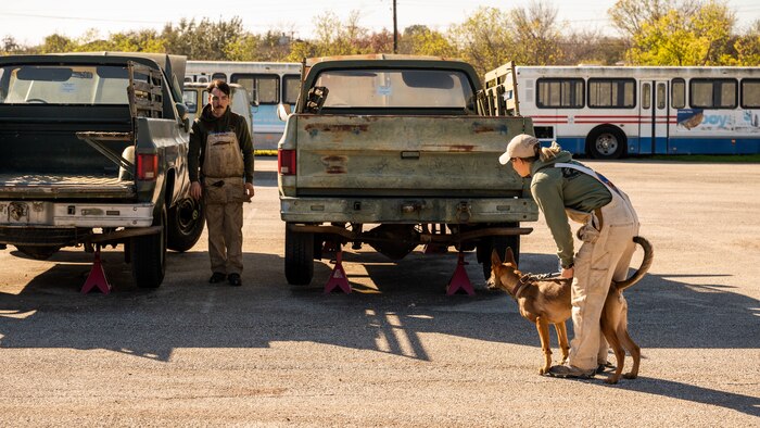A 341st Training Squadron Dog Handler demonstrates training techniques to SeaWorld trainers who participated in a cross-training collaboration on Jan. 11 and Jan. 19, 2024.