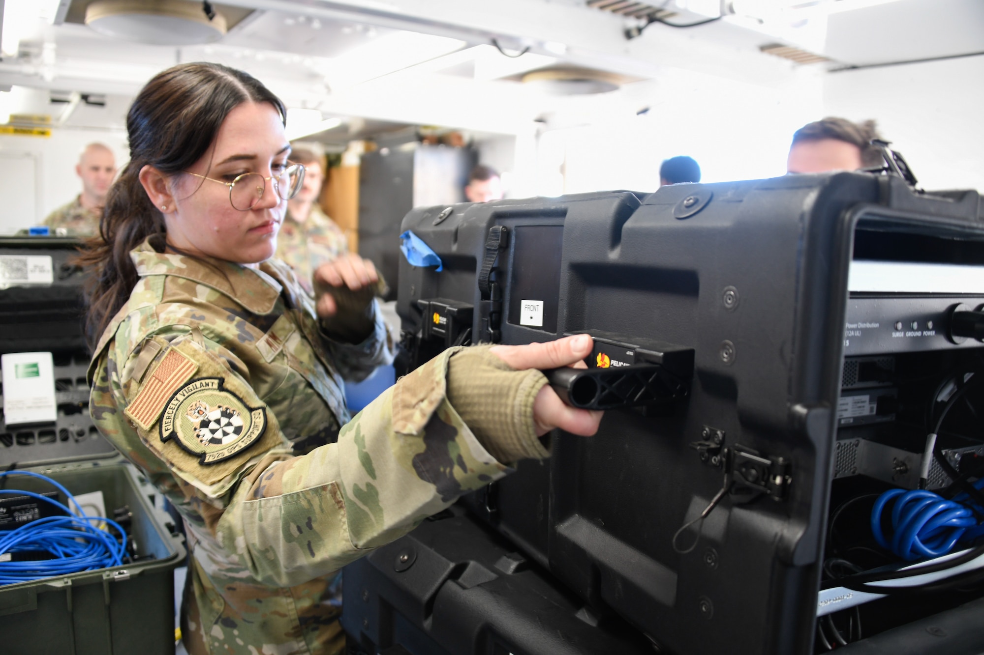 U.S. Air Force Senior Airman Carmen Mitchum, 752nd Operations Support Squadron, installs hardware for the Tactical Operations Center – Light during a training collaboration with the 134th Air Control Squadron at McConnell Air Force Base, Kansas, Jan. 29, 2024. The TOC-L system is a mobile tactical-edge battle management system designed to operate across all domains from anywhere on the battlefield.
(U.S. Air National Guard photo by Master Sgt. Matt McCoy)