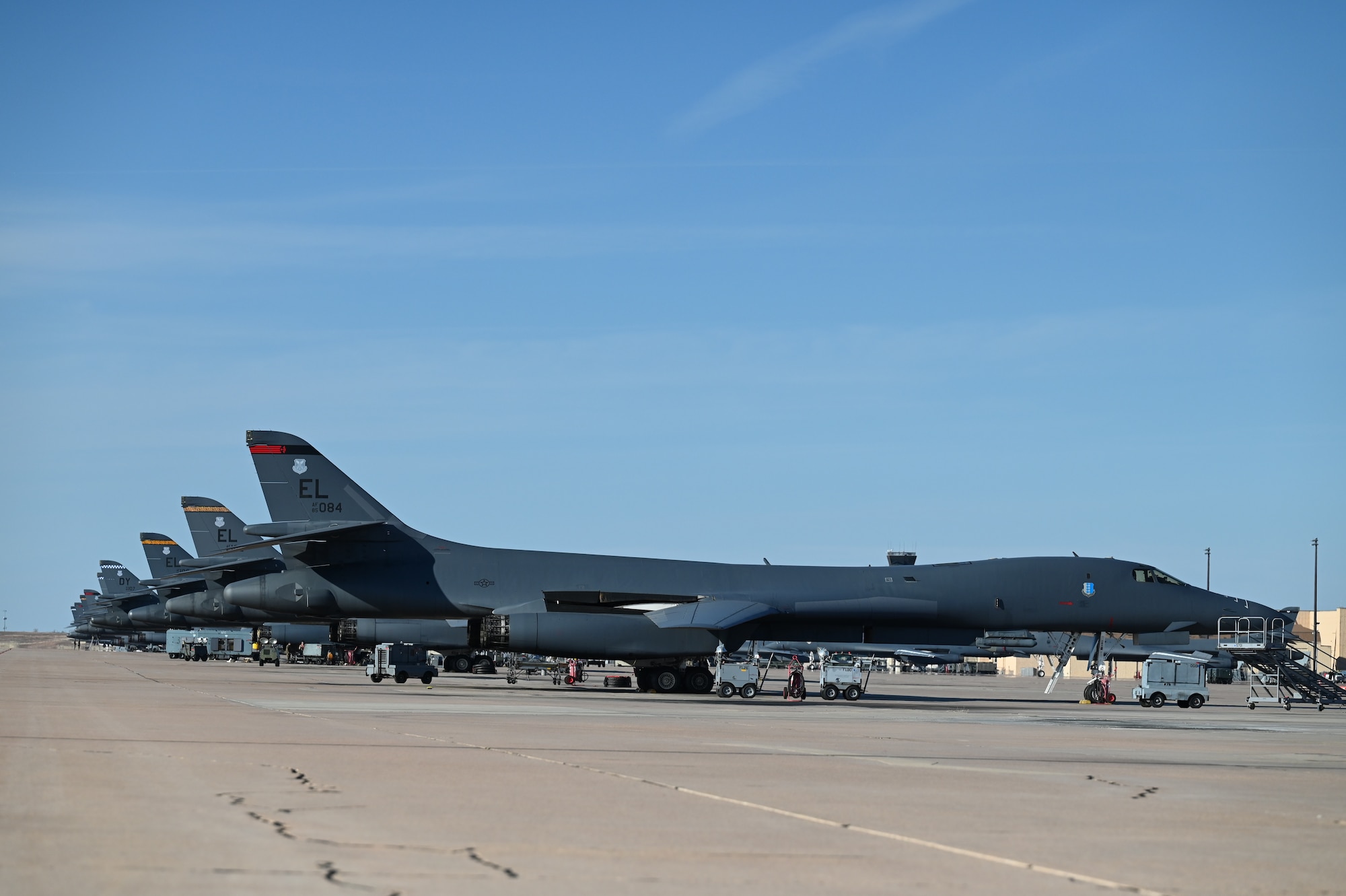 B-1B Lancers from Dyess Air Force Base and Ellsworth AFB, South Dakota, are positioned on the flightline at Dyess AFB, Texas, Feb. 1, 2024. Ellsworth Air Force Base B-1Bs recently launched from Dyess Air Force Base to support U.S. Central Command priorities, validating the United States Air Force capability to provide precision, long-range strike anytime, anywhere. (U.S. Air Force photo by Staff Sgt. Holly Cook)