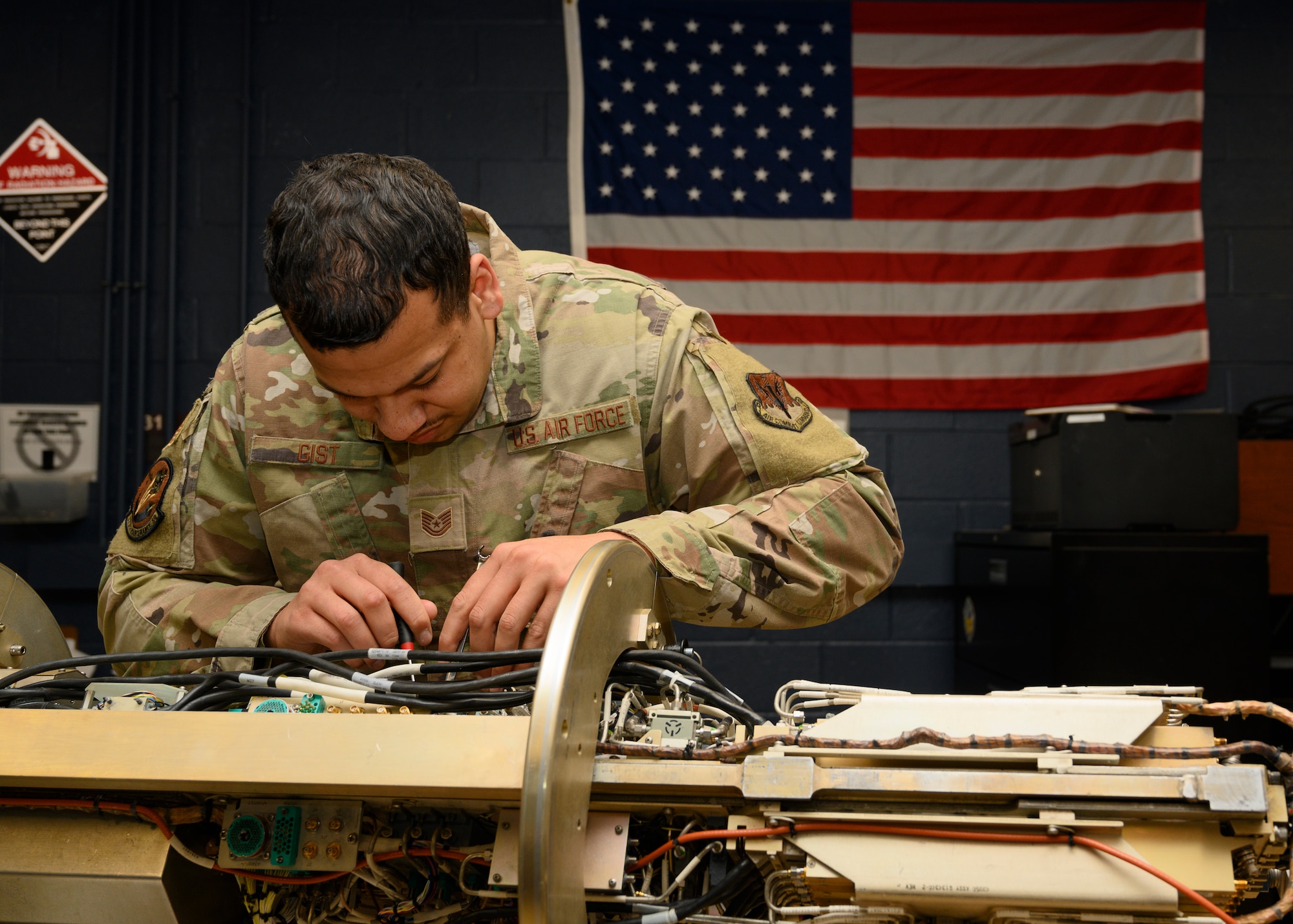 U.S. Air Force Technical Sgt. Michael Gist, an avionics test station and components specialist, 175th Maintenance Squadron, Maryland Air National Guard, diagnoses equipment used in electronic warfare, Martin State Air National Guard Base, Maryland, Jan. 26, 2024