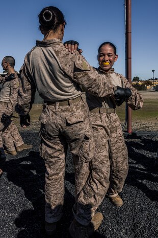 U.S. Marine Corps Recruit Aidee Calero with Mike Company, 3rd Recruit Training Battalion, participates in a Marine Corps Martial Arts Program training event at Marine Corps Recruit Depot San Diego, Jan. 29, 2024. MCMAP aims to strengthen the mental and moral resiliency of individual recruits and Marines through realistic combative training, warrior ethos studies, and physical hardening. Calero is a native of San Diego. (U.S. Marine Corps photo by Lance Cpl. Jacob B. Hutchinson)