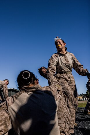 U.S. Marine Corps Recruit Aidee Calero with Mike Company, 3rd Recruit Training Battalion, participates in a Marine Corps Martial Arts Program training event at Marine Corps Recruit Depot San Diego, Jan. 29, 2024. MCMAP aims to strengthen the mental and moral resiliency of individual recruits and Marines through realistic combative training, warrior ethos studies, and physical hardening. Calero is a native of San Diego. (U.S. Marine Corps photo by Lance Cpl. Jacob B. Hutchinson)
