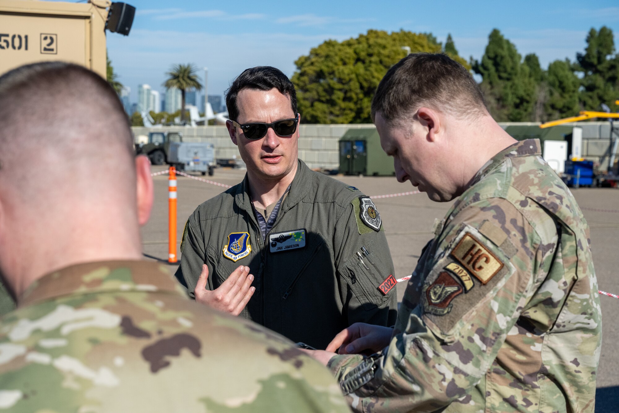 U.S. Air Force Col. Kevin Jamieson (middle), 3rd Air Expeditionary Wing commander, out of Joint Base Elmendorf-Richardson, Alaska, speaks with Airmen during a site visit during Exercise Bamboo Eagle 24-1 at spoke Naval Air Station North Island, California, Jan. 31, 2024.