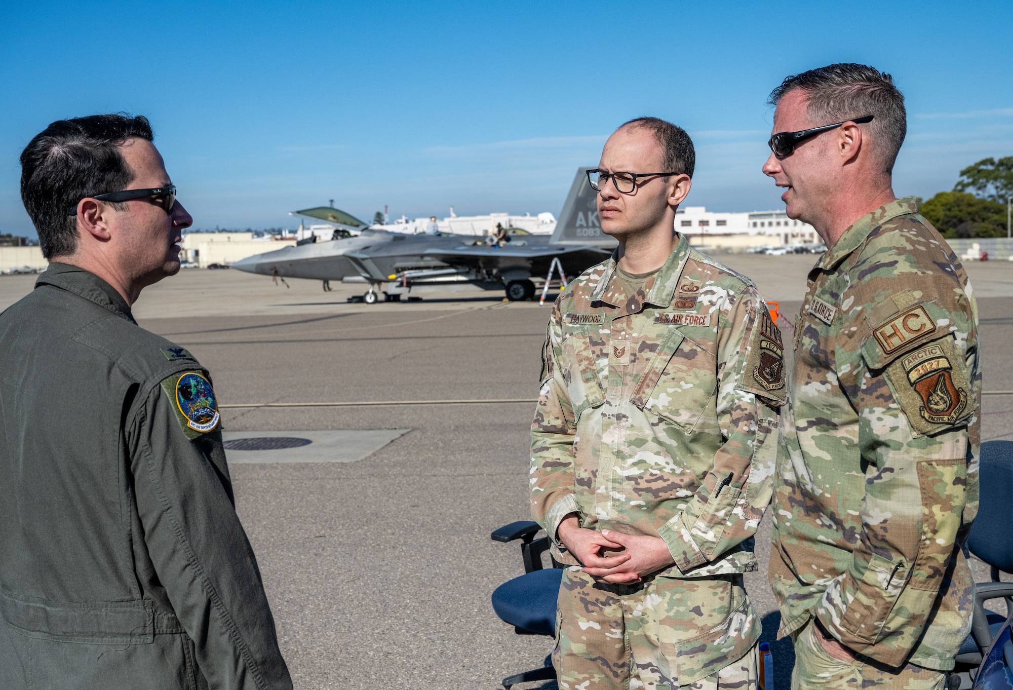 U.S. Air Force Col. Kevin Jamieson (left), 3rd Air Expeditionary Wing commander, out of Joint Base Elmendorf-Richardson, Alaska, speaks with Airmen during a site visit during Exercise Bamboo Eagle 24-1 at spoke Naval Air Station North Island, California, Jan. 31, 2024.