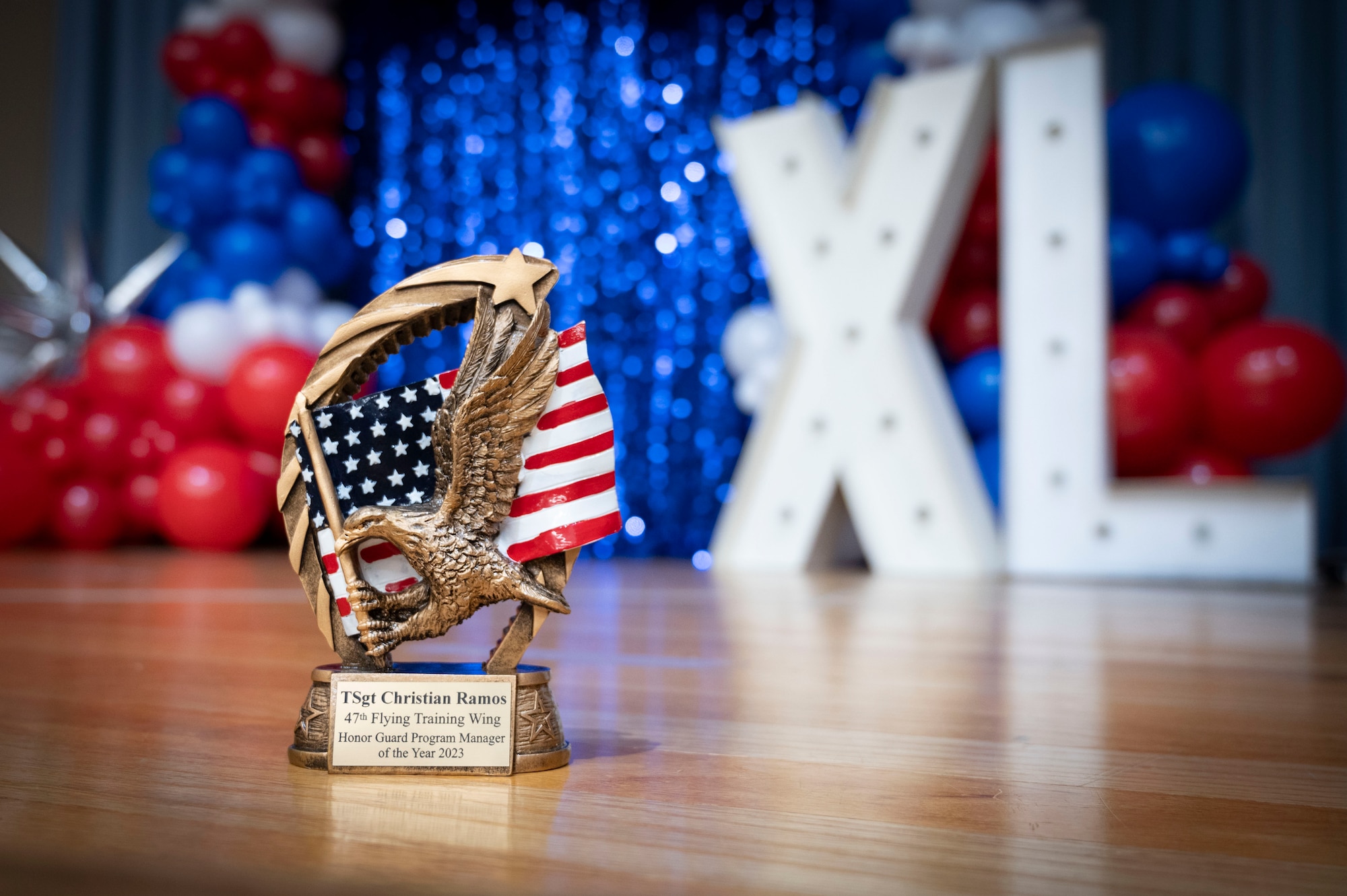 An annual award sits on the stage during the 2023 47th FTW Annual Awards Ceremony at Laughlin Air Force Base, Texas, Feb. 2, 2024. The annual awards recognized the top performers throughout the 47th Flying Training Wing during fiscal year 2023. (U.S. Air Force photo by Senior Airman Kailee Reynolds)