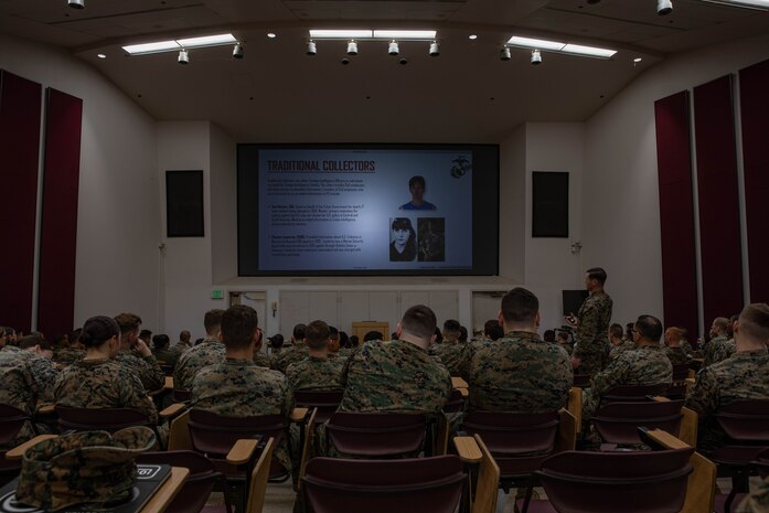 U.S. Marine Corps Staff Sgt. Jordan Hanks, with the 3rd Marine Aircraft Wing, Marine Corps Air Station Miramar, instructs Marines assigned to Headquarters and Service Battalion during an annual training event at Marine Corps Recruit Depot San Diego, Jan. 31, 2024. Back In the Saddle training is an organized, all-hands, training which reiterates and stresses responsibility and safe practice in and out of the workplace in an effort to minimize accidents and keep personnel safe. (U.S. Marine Corps photo by Lance Cpl. Sarah M. Grawcock)