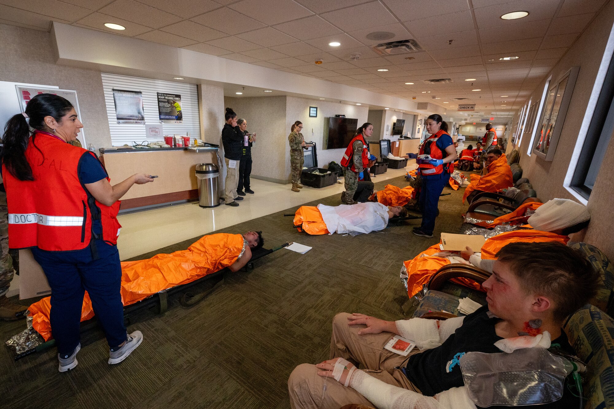 U.S. Air Force Airmen from the 47th Medical Group organize simulated casualties during exercise Ready Eagle II at Laughlin Air Force Base, Texas, Jan. 31, 2024. Exercise Ready Eagle II allowed Airmen to sharpen their response procedures, patient care skills, and increase service member survivability. The organization of patients allows for the most grievously injured to be moved to higher-level care. (U.S. Air Force photo by Staff Sgt. Nicholas Larsen)