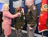 Hon. Christine Wormuth and Commanding General Johnny Davis pin USAREC Soldier during ceremony