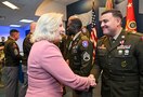 Secretary of the Army Hon. Christine Wormuth shakes hands with USAREC Recruiter