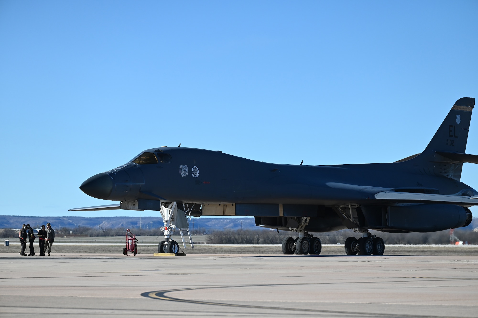 Airmen from the 28th Maintenance Group, Ellsworth Air Force Base, South Dakota, perform postflight checks on an Ellsworth AFB B-1B Lancer on the flightline at Dyess AFB, Texas, Feb. 3, 2024. (U.S. Air Force photo by Staff Sgt. Holly Cook)