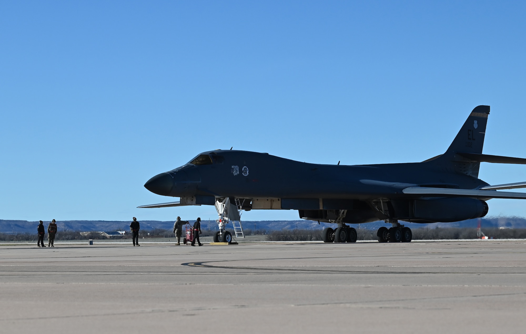 Airmen from the 28th Maintenance Group, Ellsworth Air Force Base, South Dakota, perform postflight checks on an Ellsworth AFB B-1B Lancer on the flightline at Dyess AFB, Texas, Feb. 3, 2024. (U.S. Air Force photo by Staff Sgt. Holly Cook)