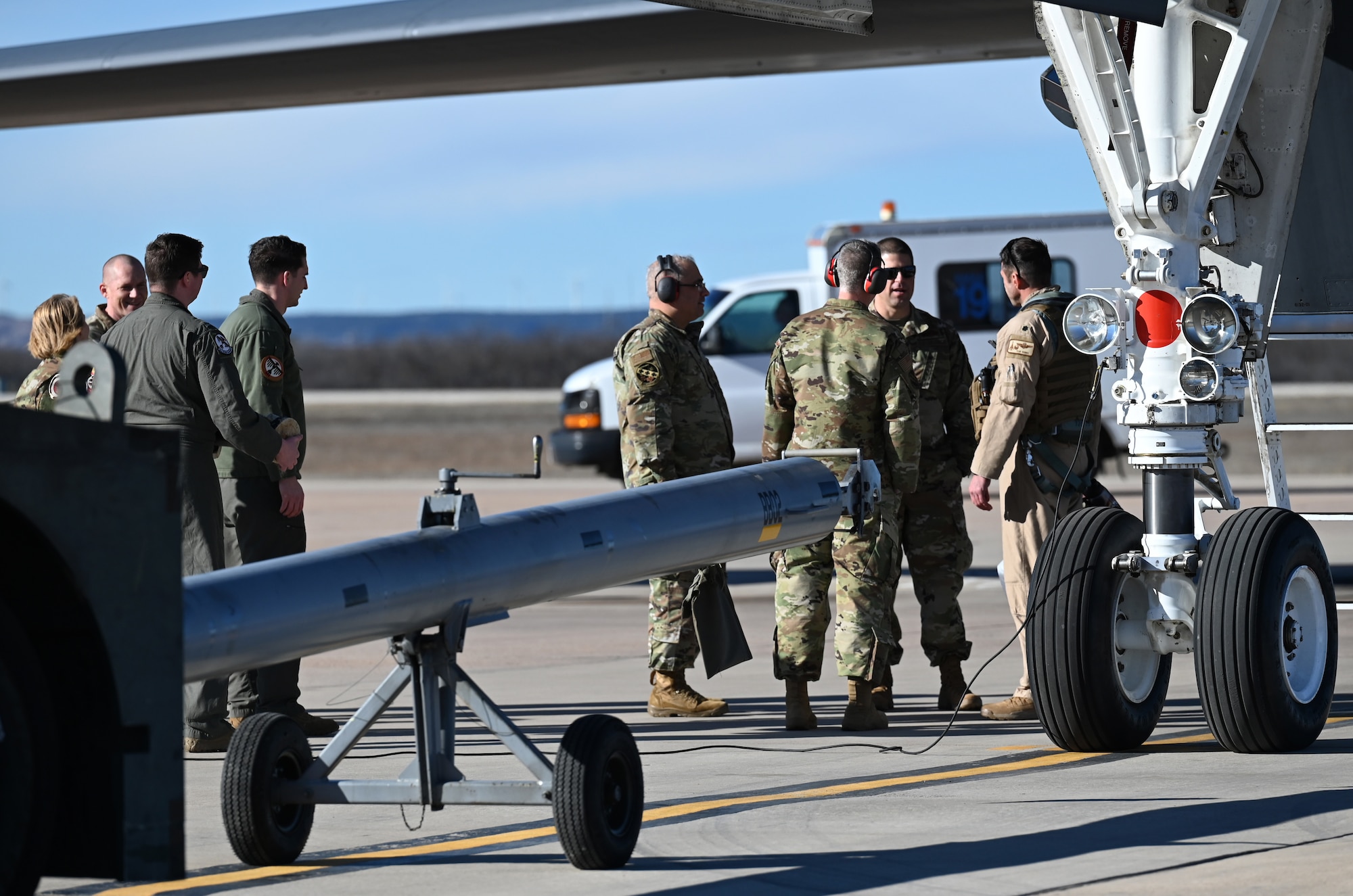 The 7th Bomb Wing leadership team greets Ellsworth Air Force Base, South Dakota, B-1B Lancer crewmembers on the flightline at Dyess AFB, Texas, Feb. 3, 2024. (U.S. Air Force photo by Staff Sgt. Holly Cook)