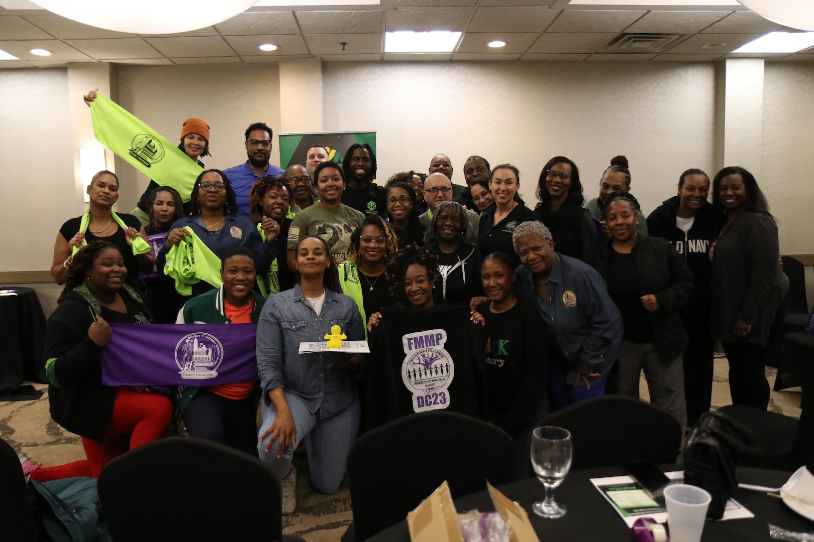 Members of the District of Columbia National Guard stand together in a photo during the Family Programs Health and Wellness workshop at the Holiday Inn Alexandria-Carlyle, Alexandria, Va., Jan 27, 2024. The workshop focused on mental health topics, stretch therapy, and nutrition.