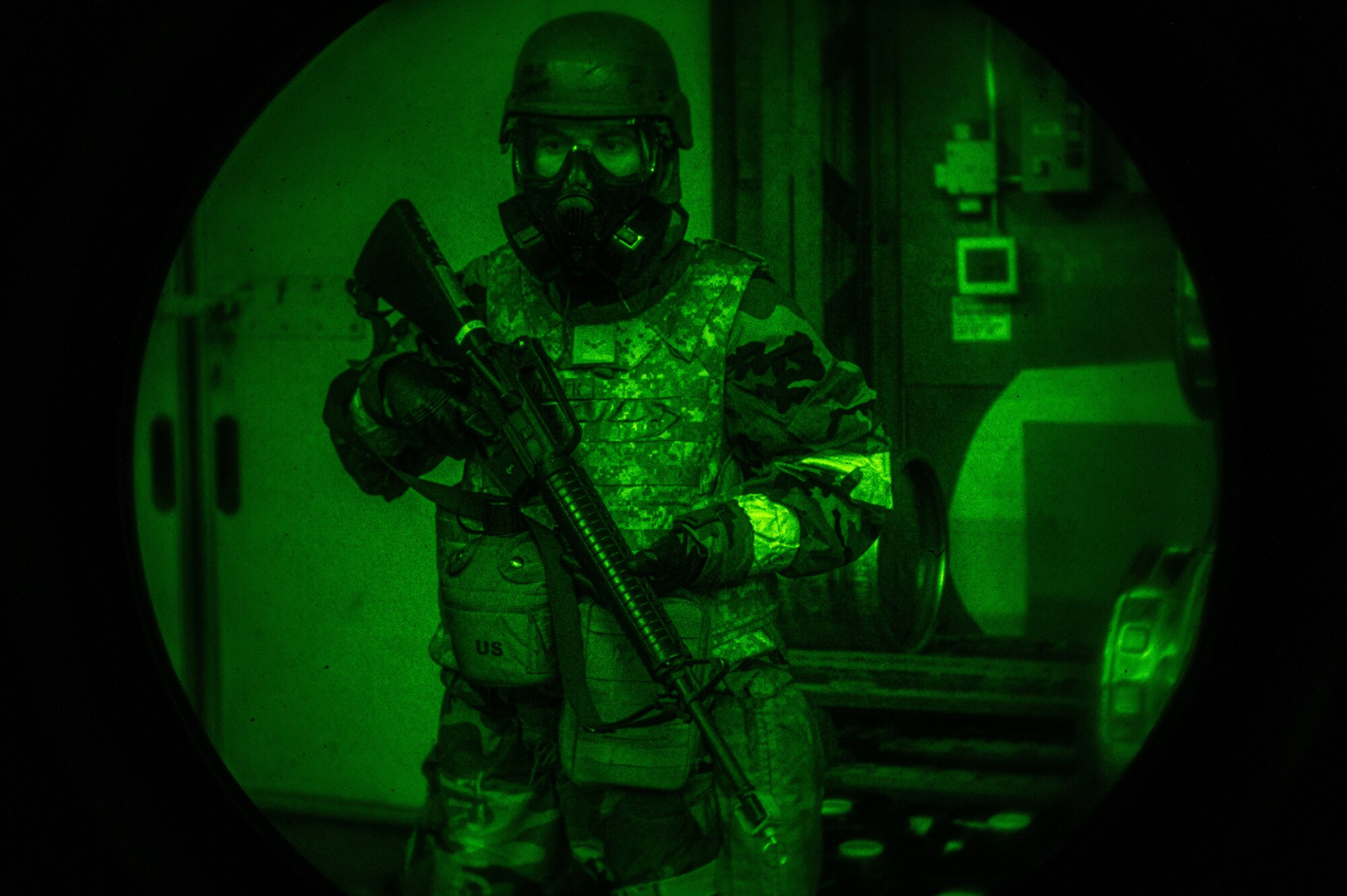 U.S. Air Force Airman 1st Class Joseph Schaefer, 51st Force Support Squadron storeroom clerk, prepares for a post attack reconnaissance sweep following a simulated attack as part of Beverly Midnight 24-1 at Osan Air Base, Republic of Korea, Jan. 30, 2024. Airmen from the 51st FSS trained in the role of  mortuary affairs when the simulated attack happened. As the most forward deployed permanently based wing in the Air Force, the 51st Fighter Wing is charged with providing mission-ready Airmen to execute combat operations and receive follow-on forces. (U.S. Air Force photo by Airman 1st Class Chase Verzaal)