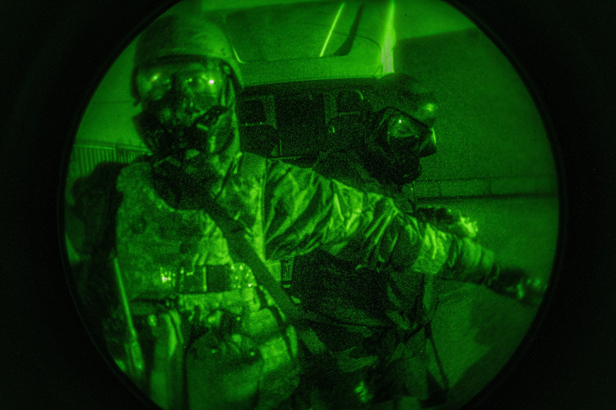U.S. Air Force Senior Airman Izeyah Minix, 51st Force Support Squadron food service journeyman, left, and Airman 1st Class Devin Dewall, 51st FSS food service journeyman, decontaminate following a simulated post attack reconnaissance sweep during Beverly Midnight 24-1 at Osan Air Base, Republic of Korea, Jan. 30, 2024. Airmen from the 51st Fighter Wing are multi-capable and can be augmented to assist with different base operations to deter potential threats. The 51st Fighter Wing guards the freedom of 51 million people by deterring aggression, defending the ROK, and defeating any attack against the ironclad ROK-US Alliance. (U.S. Air Force photo by Airman 1st Class Chase Verzaal)