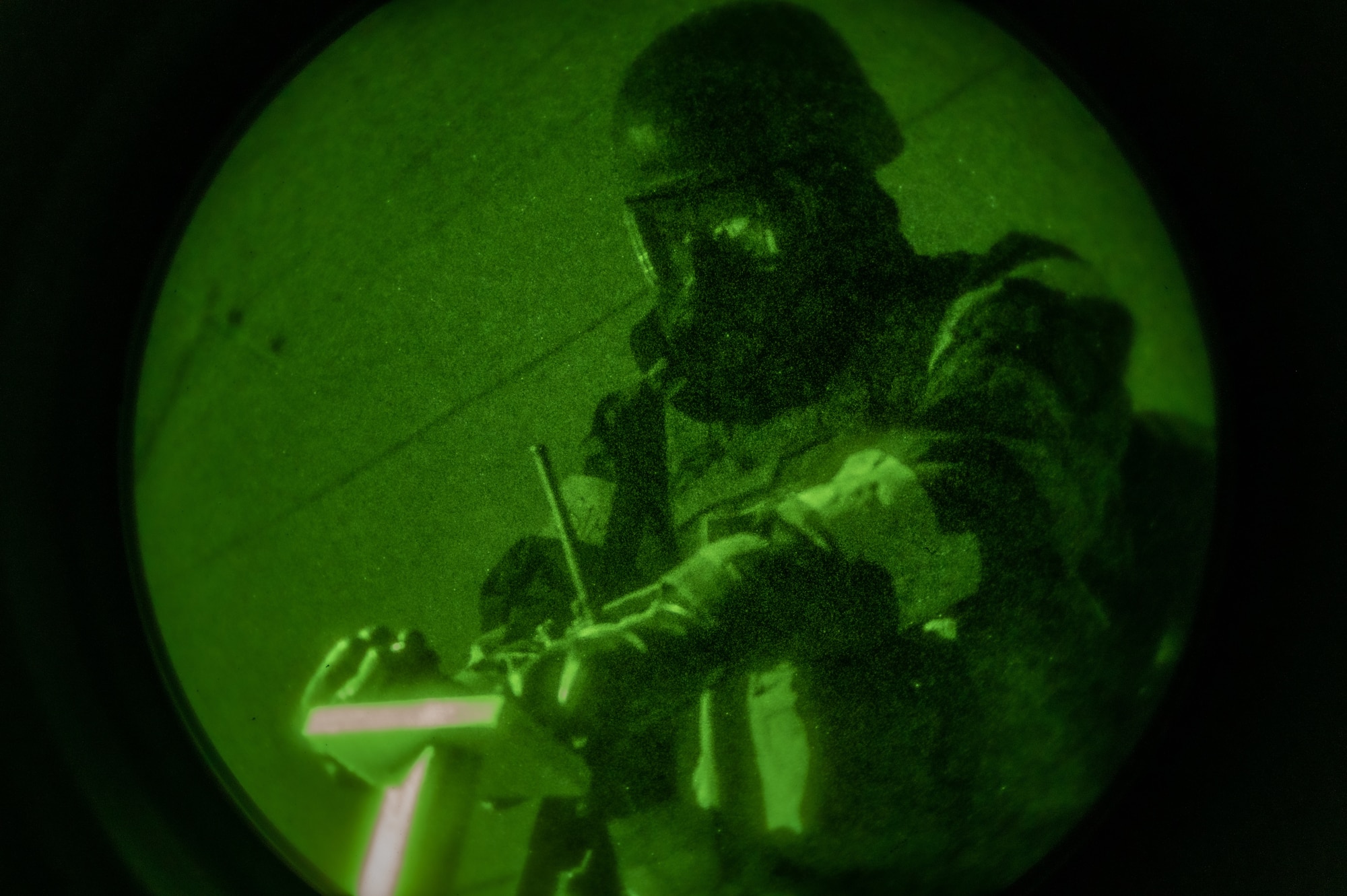U.S. Air Force Senior Airman Izeyah Minix, 51st Force Support Squadron food service journeyman, checks a post attack reconnaissance stanchion for contaminants after a simulated attack during Beverly Midnight 24-1 at Osan Air Base, Republic of Korea, Jan. 30, 2024. PAR stanchions are used to visibly determine the presence of contaminants in surrounding areas. The Airmen of the 51st Fighter Wing continuously train to maintain the high level of full-spectrum readiness required to execute the mission proficiently and effectively. (U.S. Air Force photo by Airman 1st Class Chase Verzaal)