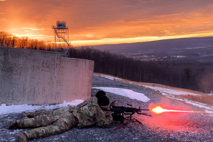 U.S. Soldiers with the Pennsylvania National Guard fire M249 light machine guns during the crew served weapons course at Fort Indiantown Gap, Pennsylvania, Jan. 31, 2024. The crew served weapons course is offered through the Pennsylvania National Guard's Individual Training Branch. 36 students from units across the state honed in their marksmanship skills by training on the M249 light machine gun, M240B machine gun, Mark 19 40 mm grenade machine gun and M2A1 machine gun in order to become subject matter experts on those weapon systems. (U.S. Army National Guard photo by Sgt. 1st Class Rani Doucette)